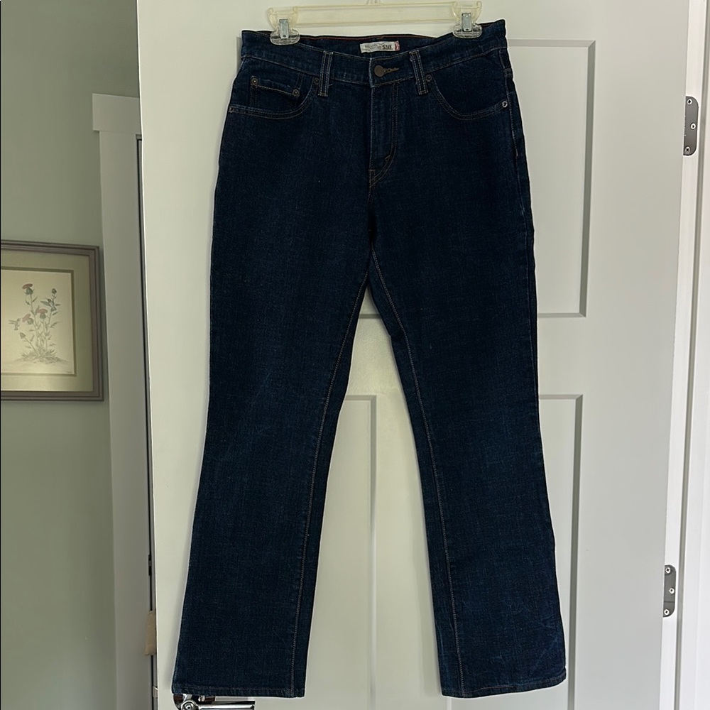 Dark wash Levi’s 550 relaxed boot cut